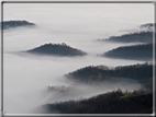 foto Colline nella nebbia al Tramonto